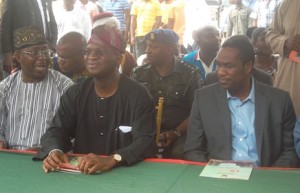 Governor Babatunde Fashola of Lagos State (Middle), Commissioner for Works and Infrastructure, Dr Kadri Obafemi Hamzat (Right) and Mr Bolaji Yusuf Ayinla (Left)